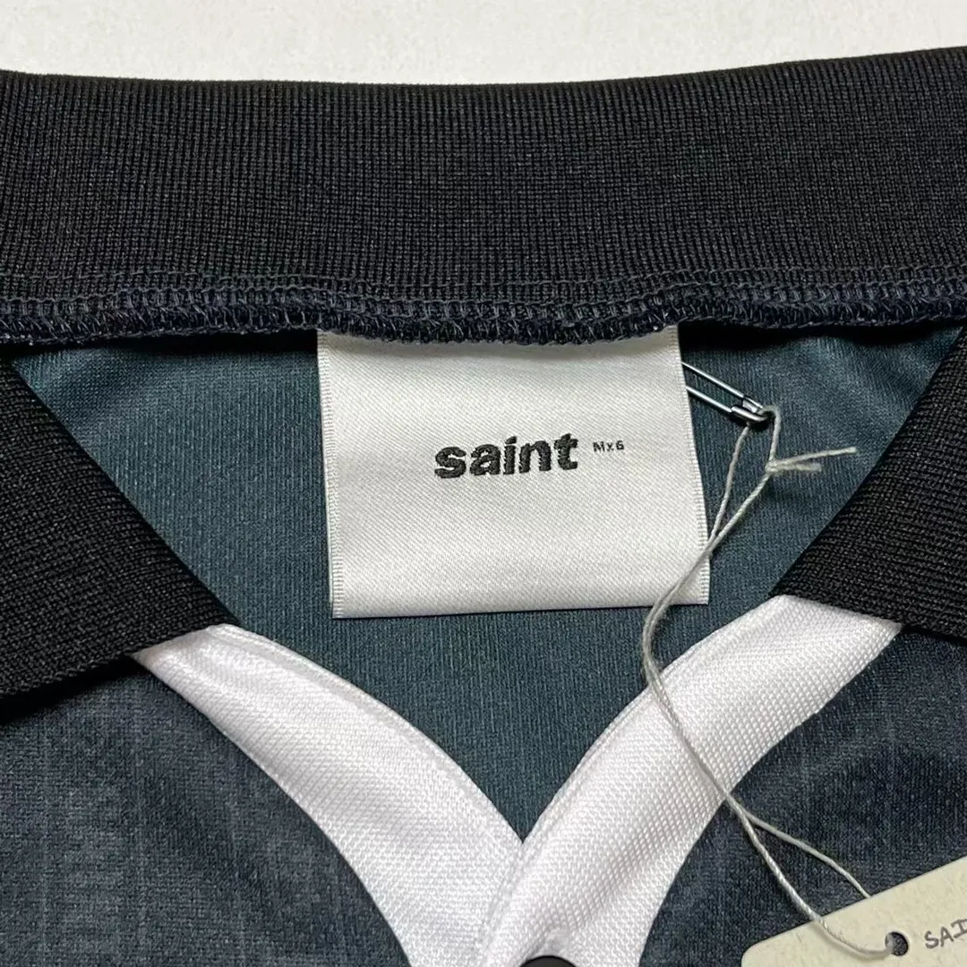 SAINT M×××××× SOCCER SHIRT 'FAITH'/BLK FAITH Football Long Sleeve Black S-XL This design has a lot of craftsmanship Digital fabric printing/front positioning printing laser cutting Offset printing + flocking printing + embossing Imported Behringer machine embroidery Flat machine collar + cuffs Genuine consistent main mark/wash mark/cherub mark
